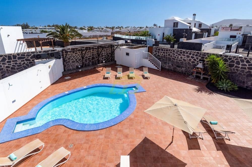4 quarto Moradia para venda em Playa Blanca com piscina garagem - 540 000 € (Ref: 9815439)