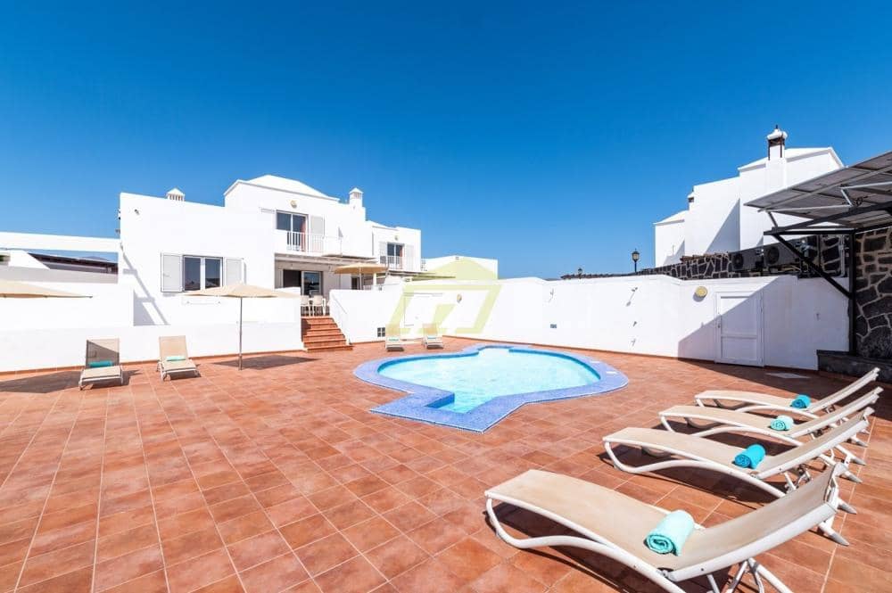 4 quarto Moradia para venda em Playa Blanca com piscina garagem - 540 000 € (Ref: 9815439)
