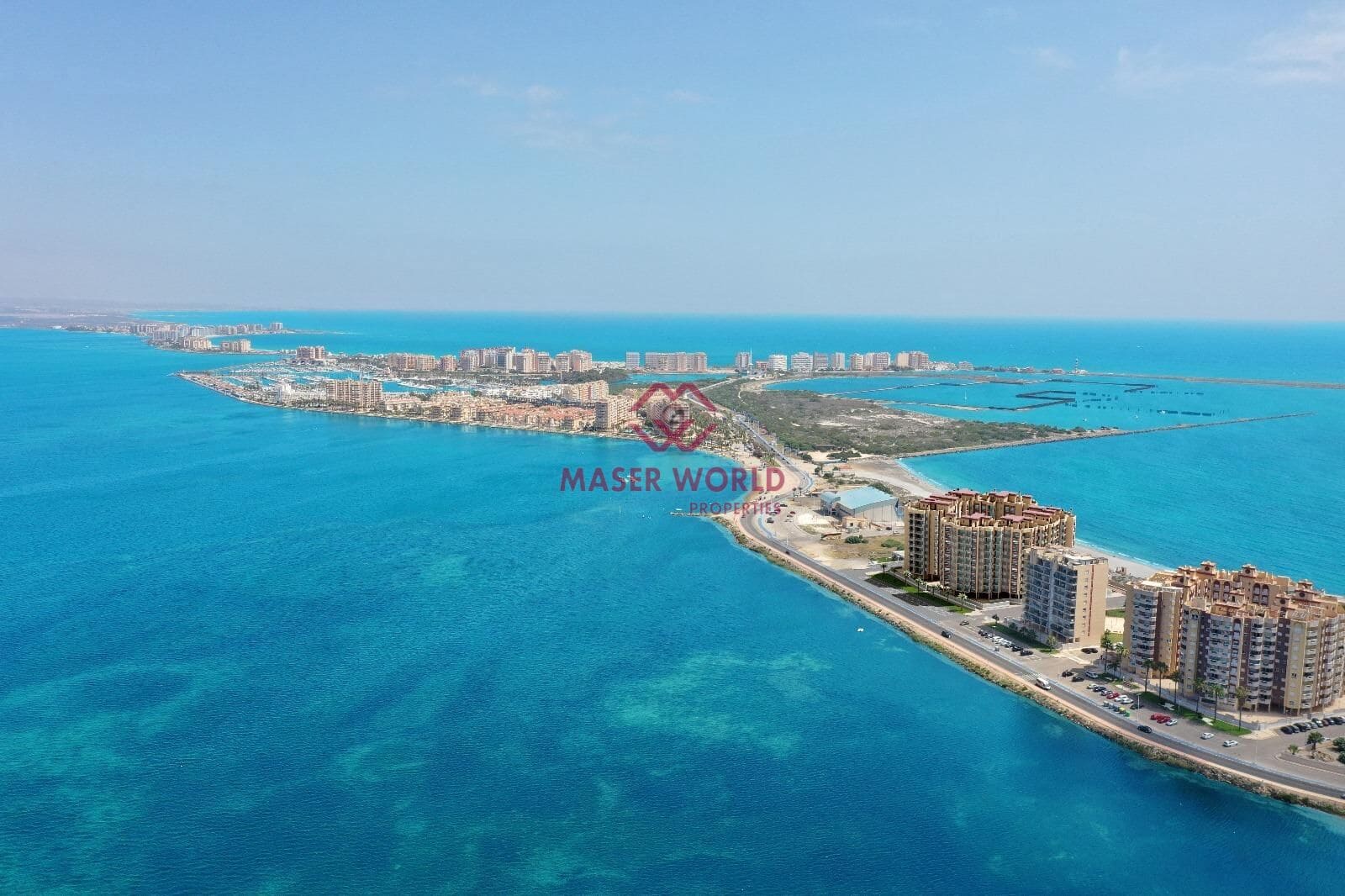 Ático de 2 habitaciones en La Manga del Mar Menor en venta con piscina garaje - 345.000 € (Ref: 9343276)