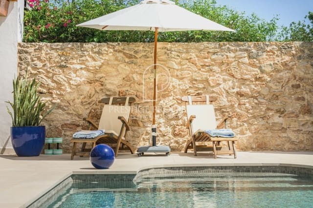 2 soveværelse Rækkehus til salg i Santa Eulalia / Santa Eularia med swimmingpool garage - € 1.400.000 (Ref: 9928628)
