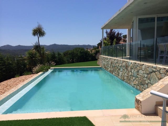 4 Zimmer Villa zu verkaufen in Castell d'Aro, Castell-Platja d'Aro mit Pool Garage - 1.850.000 € (Ref: 10095483)