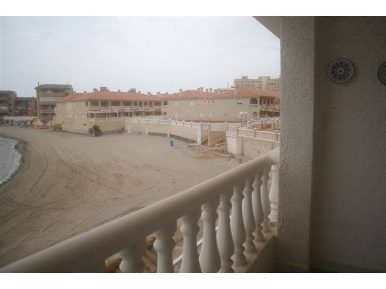 Apartamento de 3 habitaciones en La Manga del Mar Menor en venta con piscina garaje - 350.000 € (Ref: 9793913)