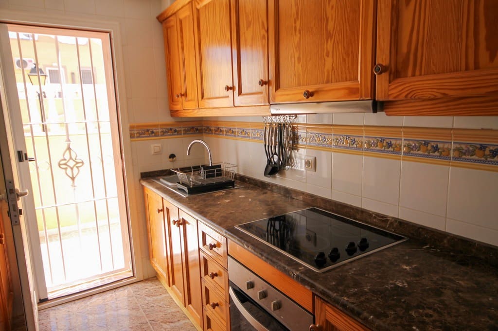 3 sypialnia Dom szeregowy na sprzedaż w Orihuela Costa z basenem garażem - 235 000 € (Ref: 10118828)