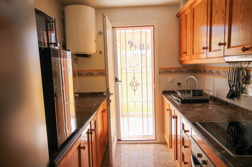3 sypialnia Dom szeregowy na sprzedaż w Orihuela Costa z basenem garażem - 235 000 € (Ref: 10118828)