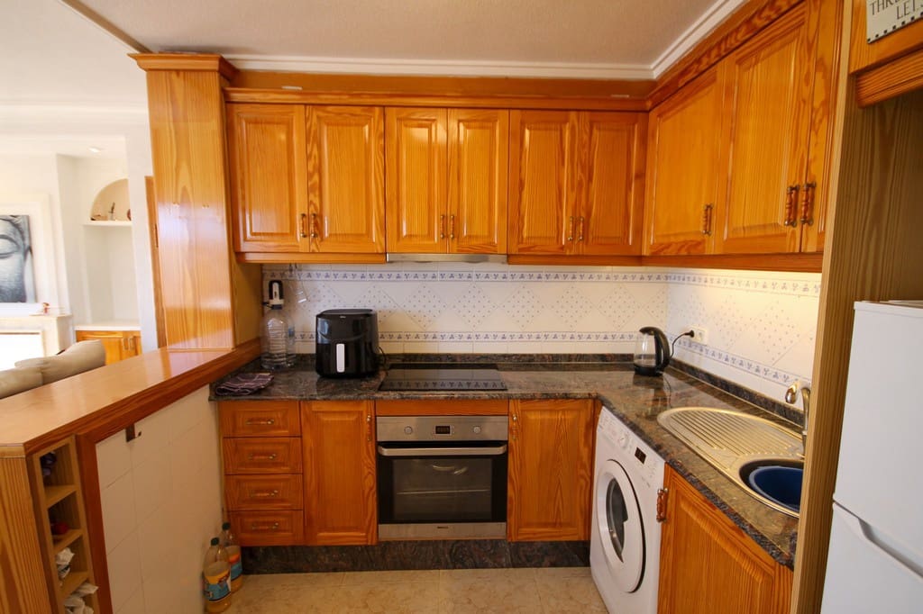 2 sypialnia Dom blizniak na sprzedaż w Orihuela Costa z basenem - 215 000 € (Ref: 9915304)
