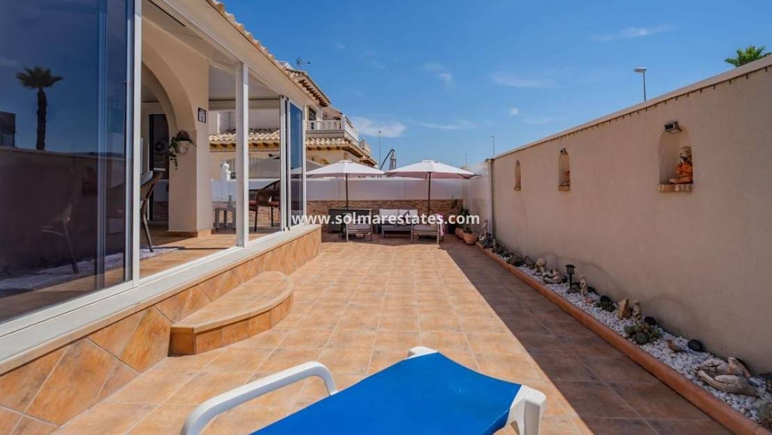 3 quarto Moradia Geminada para venda em Cabo Roig com piscina - 315 000 € (Ref: 10021716)