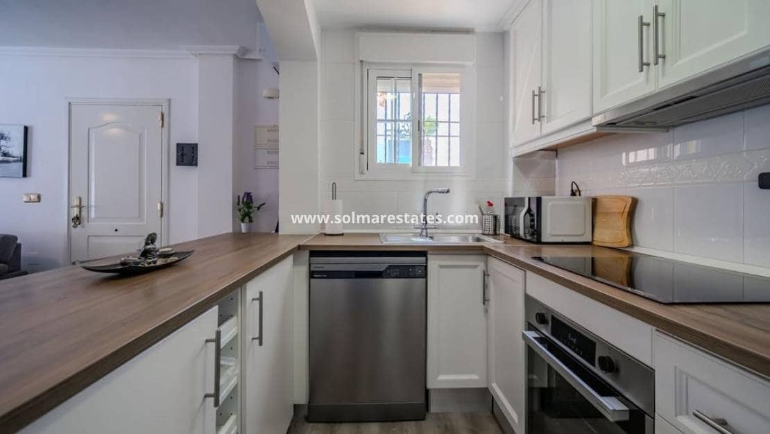 3 quarto Moradia Geminada para venda em Cabo Roig com piscina - 315 000 € (Ref: 10021716)