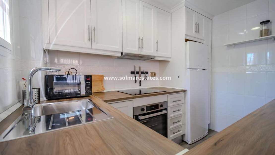 3 quarto Moradia Geminada para venda em Cabo Roig com piscina - 315 000 € (Ref: 10021716)