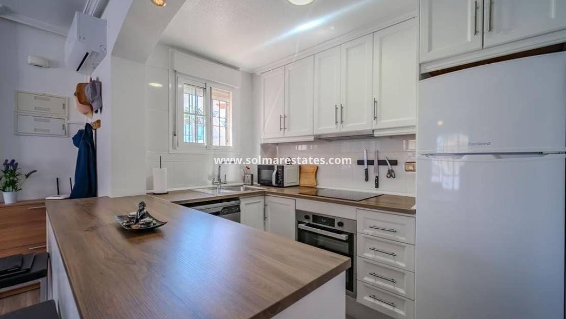 3 quarto Moradia Geminada para venda em Cabo Roig com piscina - 315 000 € (Ref: 10021716)