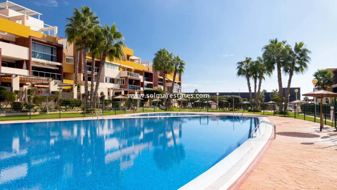 2 sypialnia Apartament na sprzedaż w Playa Flamenca z basenem garażem - 210 000 € (Ref: 10165430)