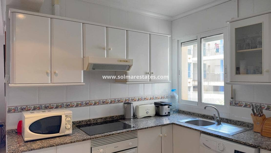 2 Zimmer Apartment zu verkaufen in Cabo Roig mit Pool Garage - 184.950 € (Ref: 10175737)