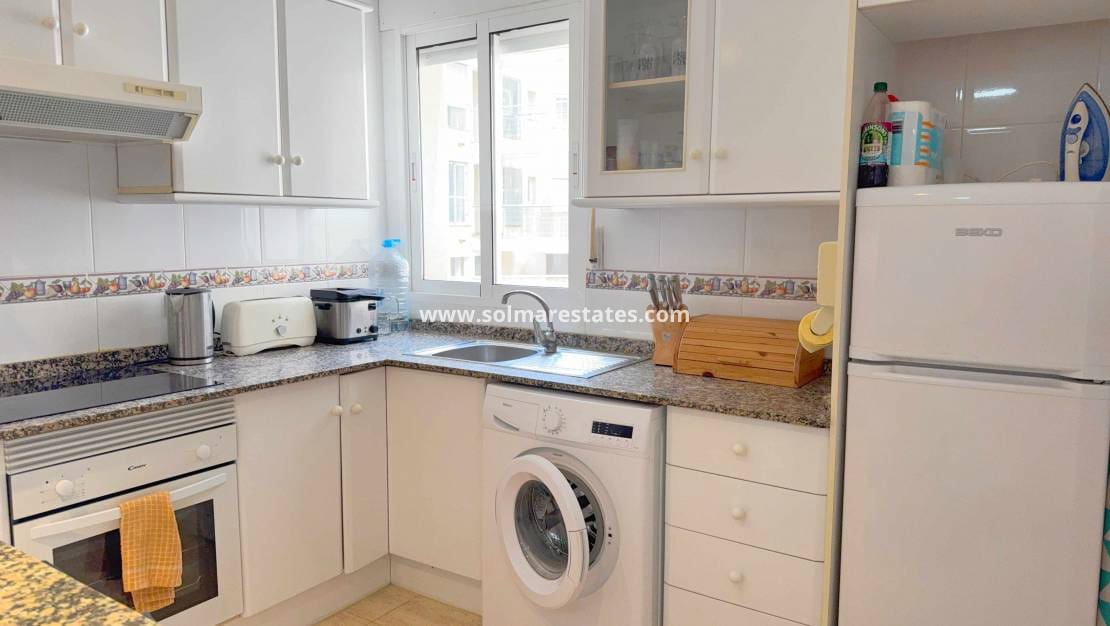 2 Zimmer Apartment zu verkaufen in Cabo Roig mit Pool Garage - 184.950 € (Ref: 10175737)