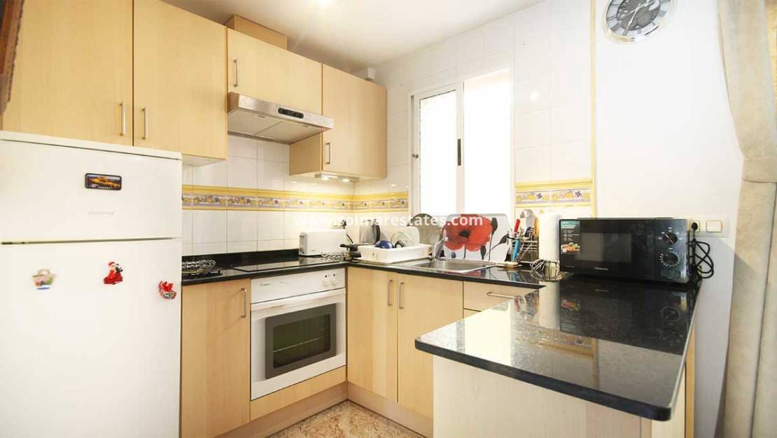 2 soverom Kjedet enebolig til salgs i Villamartin med svømmebasseng - € 165 000 (Ref: 8910669)