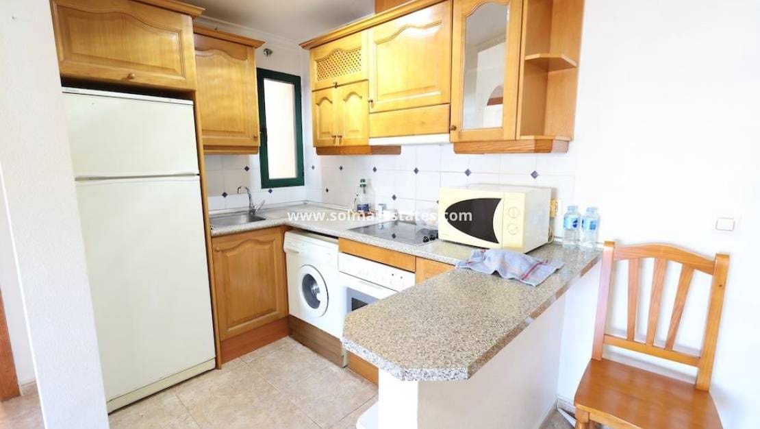 2 makuuhuone Huoneisto myytävänä paikassa Cabo Roig mukana uima-altaan - 160 000 € (Ref: 9402534)