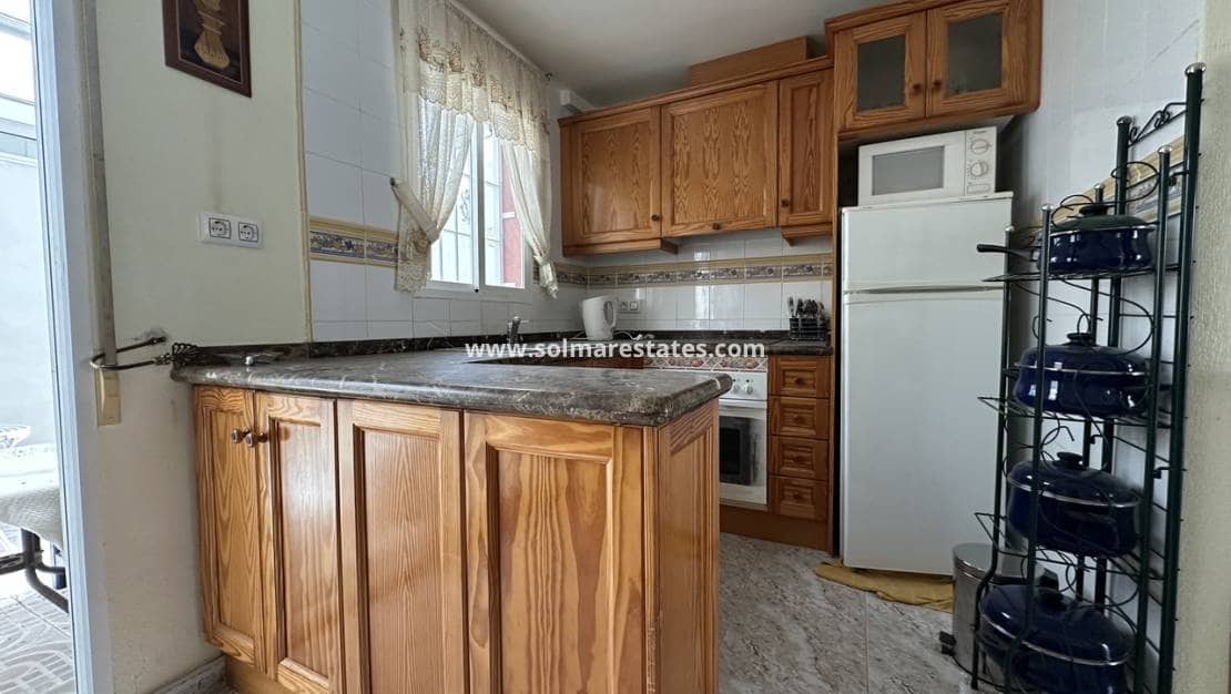 2 bedroom Semi-detached Villa for sale in Cabo Roig with pool - € 160,000 (Ref: 9451505)