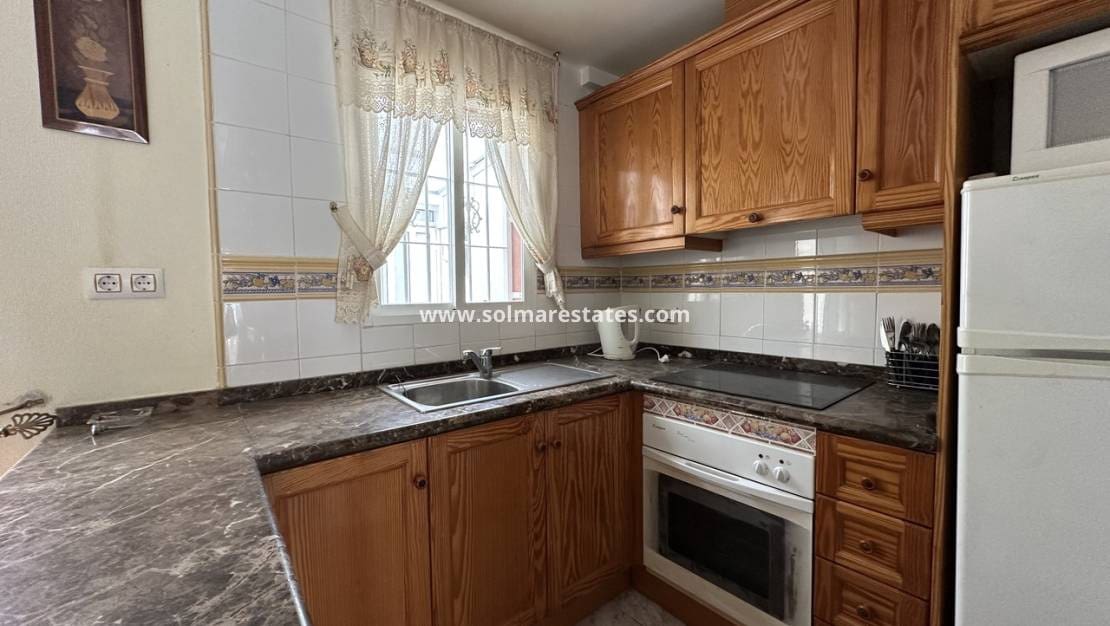 2 bedroom Semi-detached Villa for sale in Cabo Roig with pool - € 160,000 (Ref: 9451505)