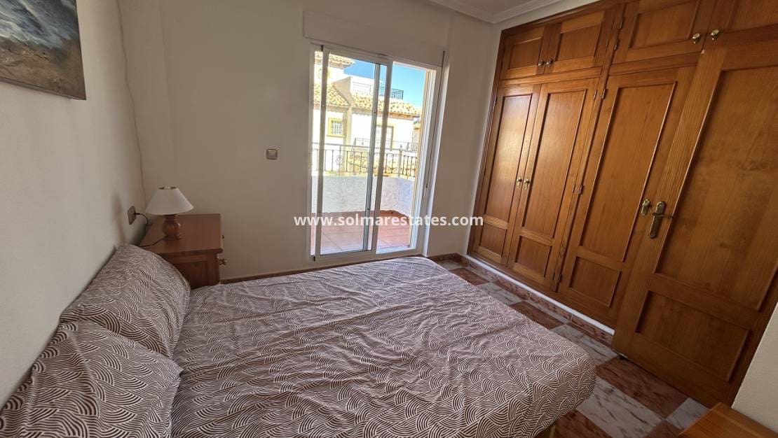 2 sypialnia Dom blizniak na sprzedaż w Cabo Roig z basenem - 240 000 € (Ref: 9588146)