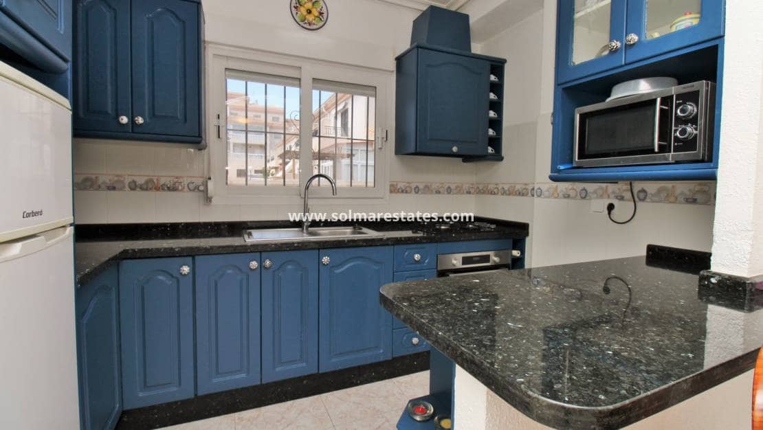 3 soverom Kjedet enebolig til salgs i Playa Flamenca med svømmebasseng - € 249 950 (Ref: 9789588)