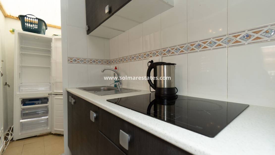 3 quarto Casa em Banda para venda em Playa Flamenca com piscina - 195 000 € (Ref: 9905059)