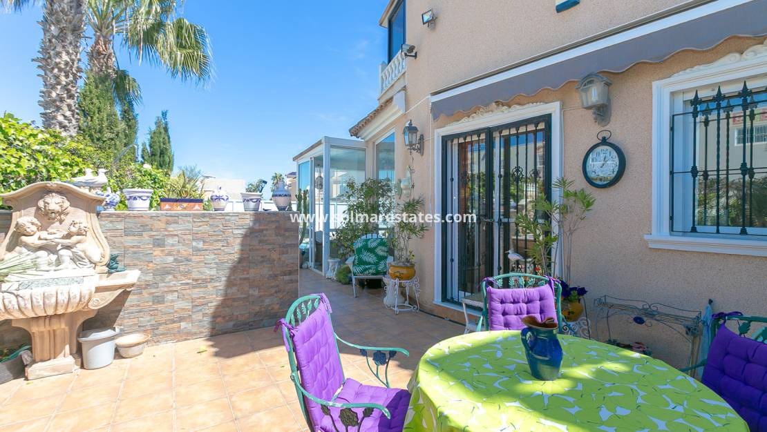 2 bedroom Semi-detached Villa for sale in Cabo Roig with pool - € 289,000 (Ref: 9905060)