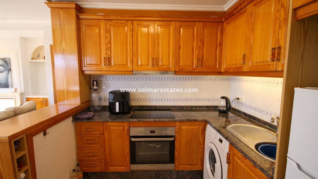 2 makuuhuone Paritalo myytävänä paikassa Villamartin mukana uima-altaan - 215 000 € (Ref: 9935407)