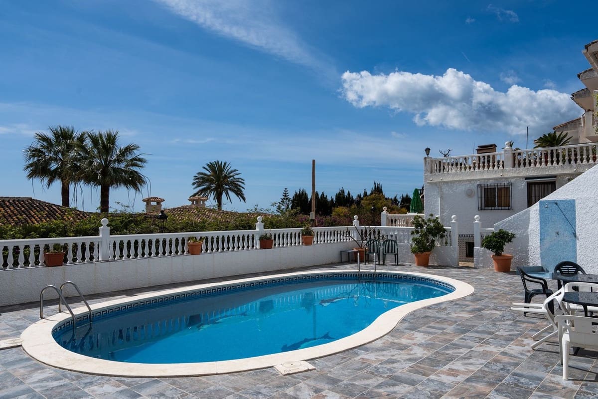 3 sypialnia Dom na sprzedaż w Benalmadena z basenem garażem - 495 000 € (Ref: 9720500)