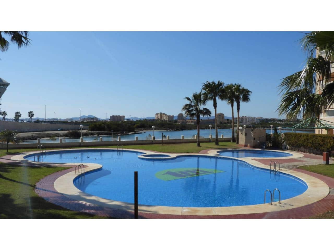 Piso de 1 habitación en La Manga del Mar Menor en venta con piscina garaje - 175.000 € (Ref: 9721022)